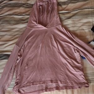 a pink light jacket, cropped, with hood